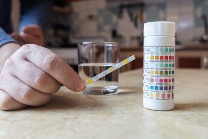 Home water test kit used to check iron levels before choosing softener salt