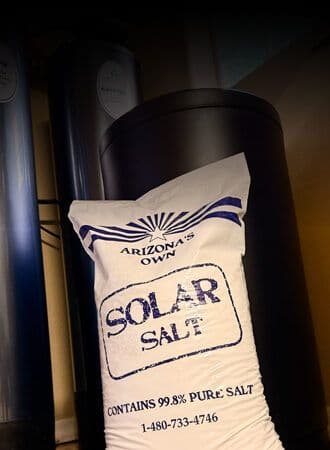 bag of solar salt used in home water filtration setup