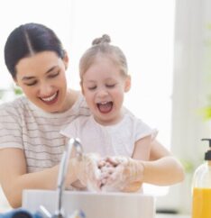 Family using conditioned water from a salt-free softening system