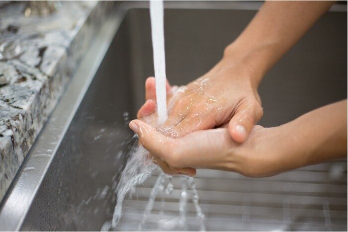 Phoenix homeowner enjoying the benefits of a whole-house water softening system