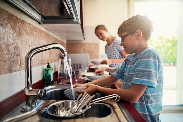 Household size influencing water softener operating cost in Phoenix homes