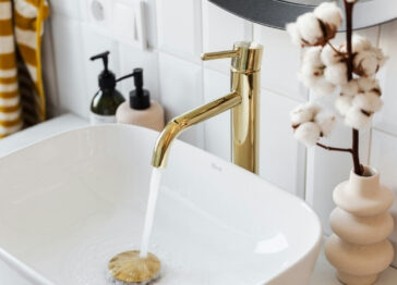 Reduced scale bathroom faucet after salt-free water conditioning system installation in Phoenix