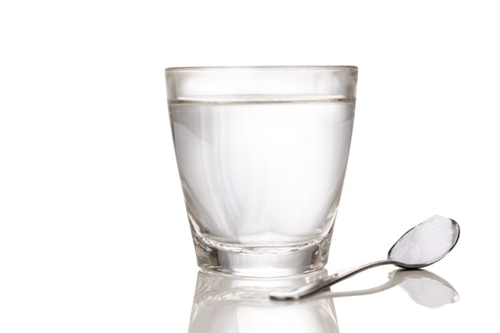 Glass of drinking water illustrating common concerns about sodium in softened water