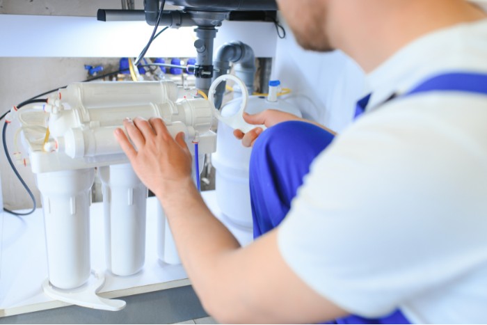 Reverse osmosis system installation to improve drinking water quality