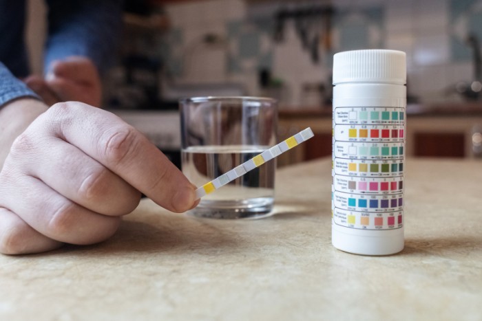 Home water test kit used to check iron levels before choosing softener salt