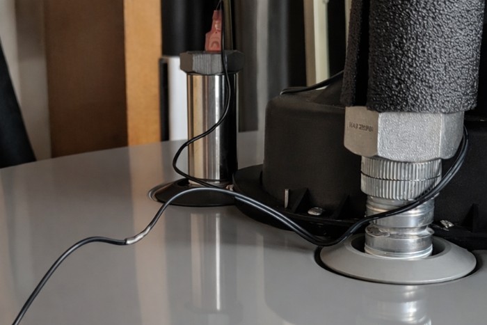 Water heater top surface with visible anode rod component